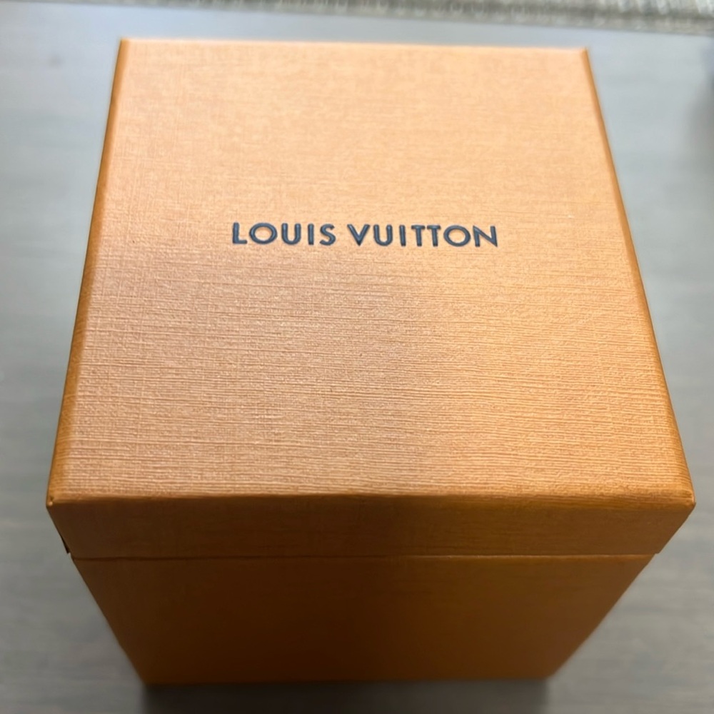 Authentic LV jewelry box . A box and pouch can fit .